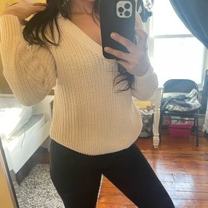 Sweater from pink knitted